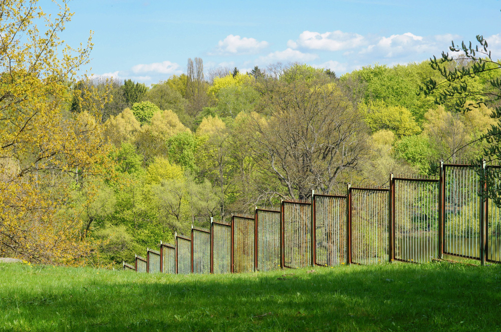 Fence Installation on Hilly Terrain: A Complete Guide for Durable Boundaries