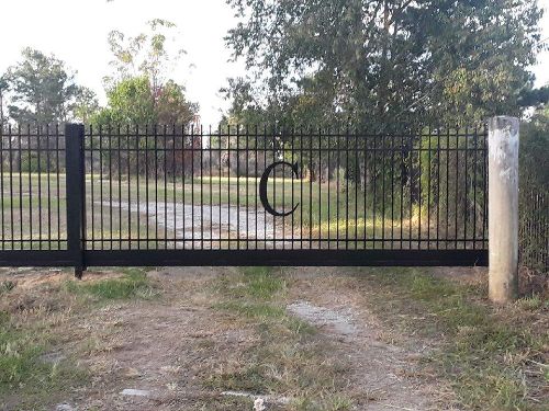 Aluminum fence with a custom C letter