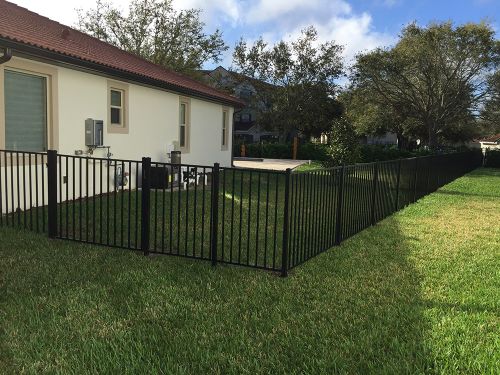 Aluminum fence surrounding a residential property