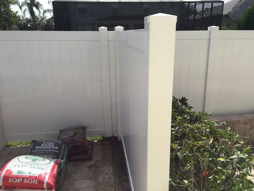 Vinyl fence as a border inside a property