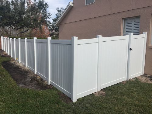 Privacy vinyl fence around a residential property