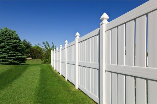 Vinyl fence around the property