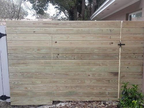 Simple horizontal wood fence and gate