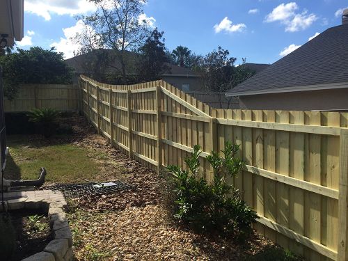 Wood fence around residential property