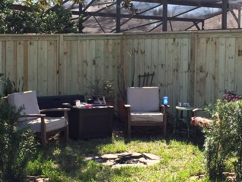 Privacy wood fence in backyard