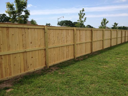 Privacy wood fence around yard